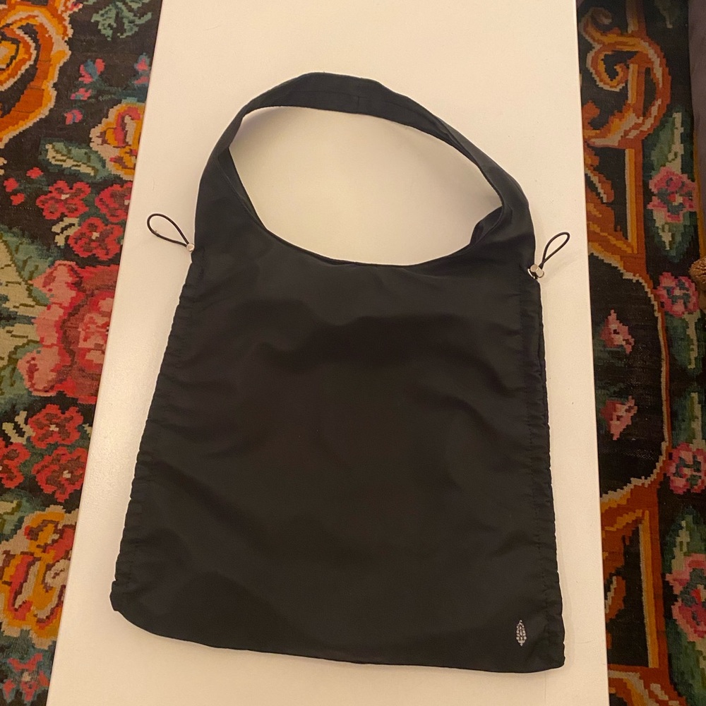 Free people black exercise bag with silver details